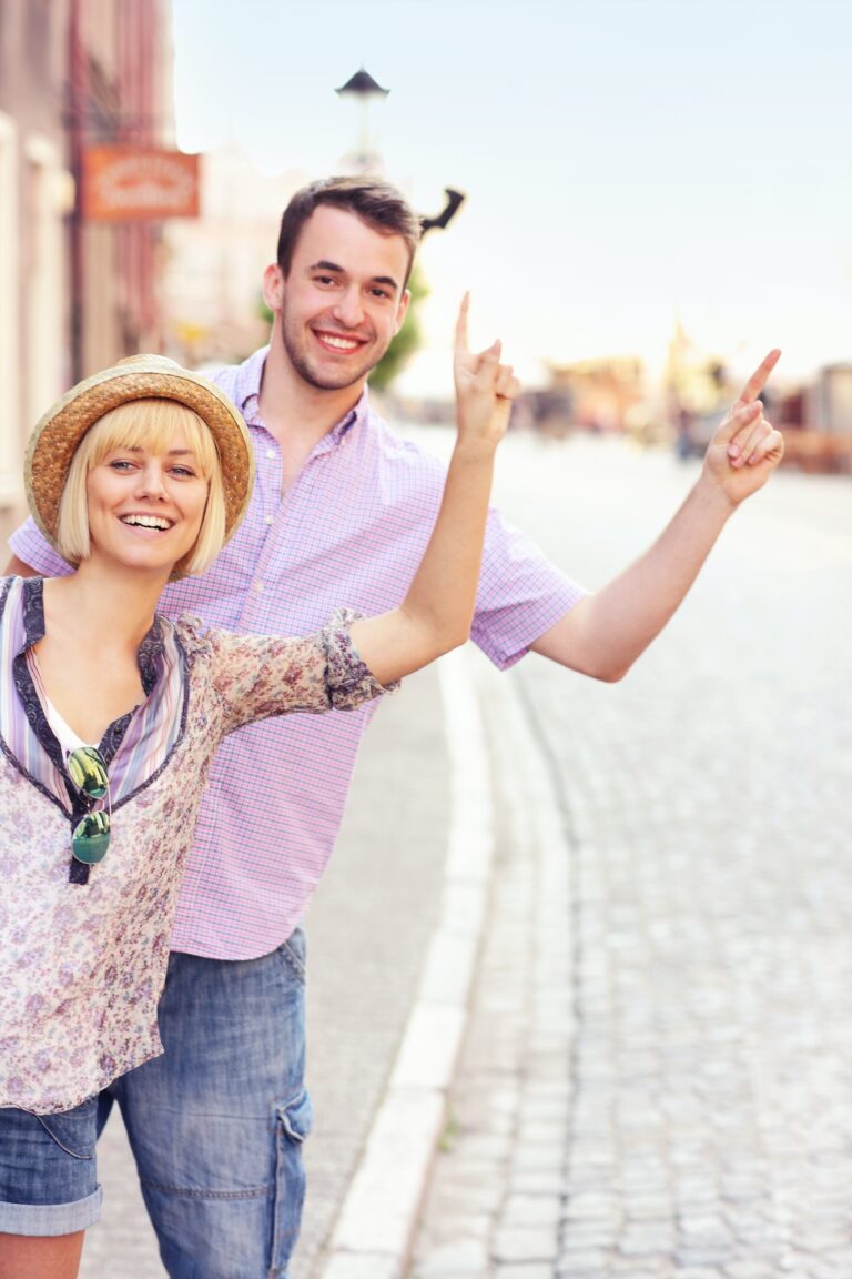 Tourists hailing a taxi